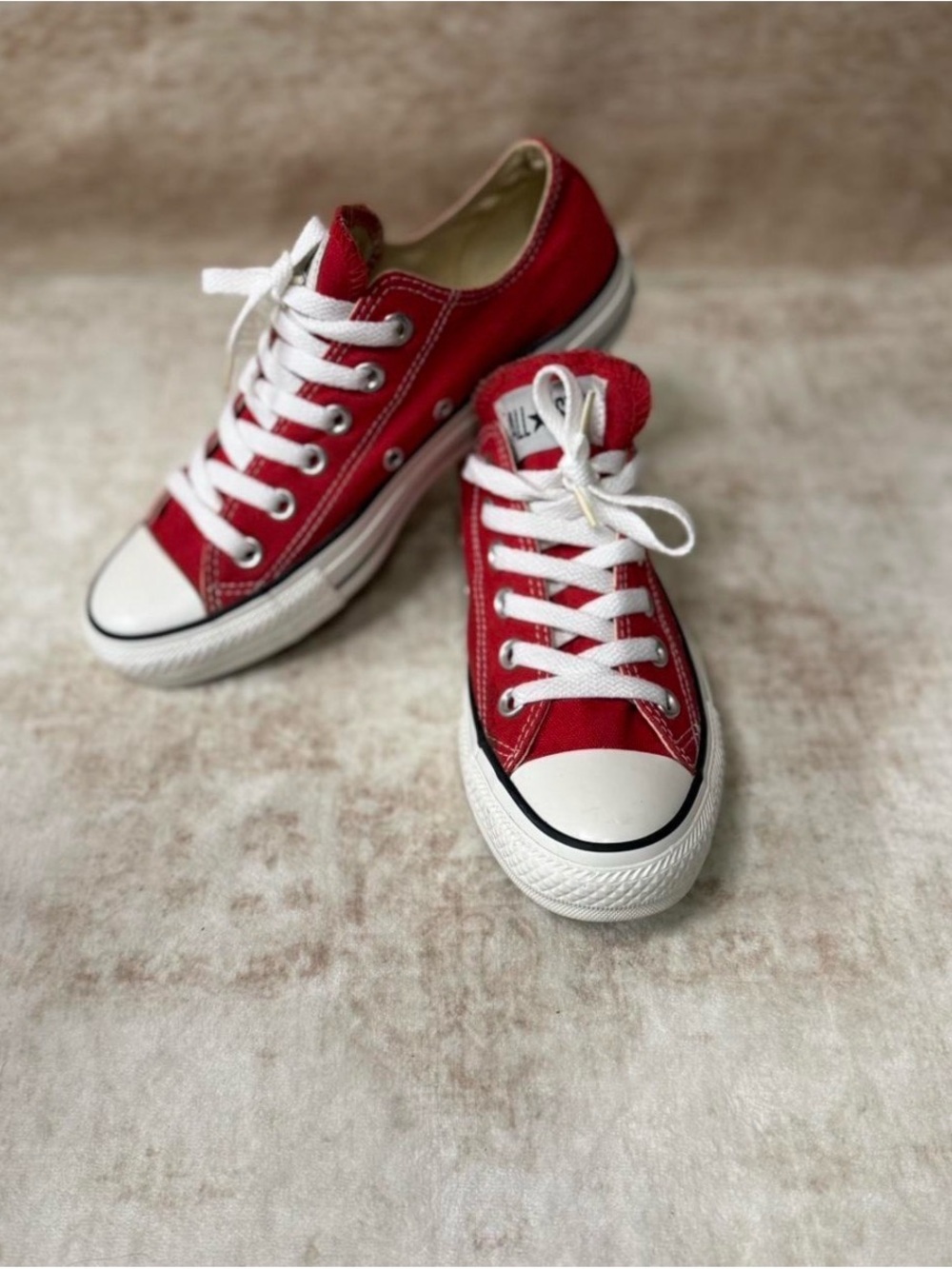 Classic red Converse Chuck Taylor All Star low top sneakers